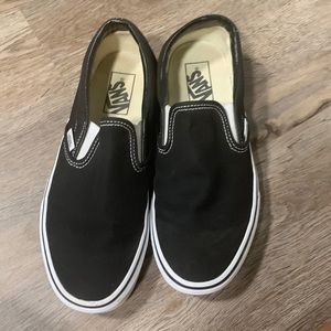 Black vans slip on